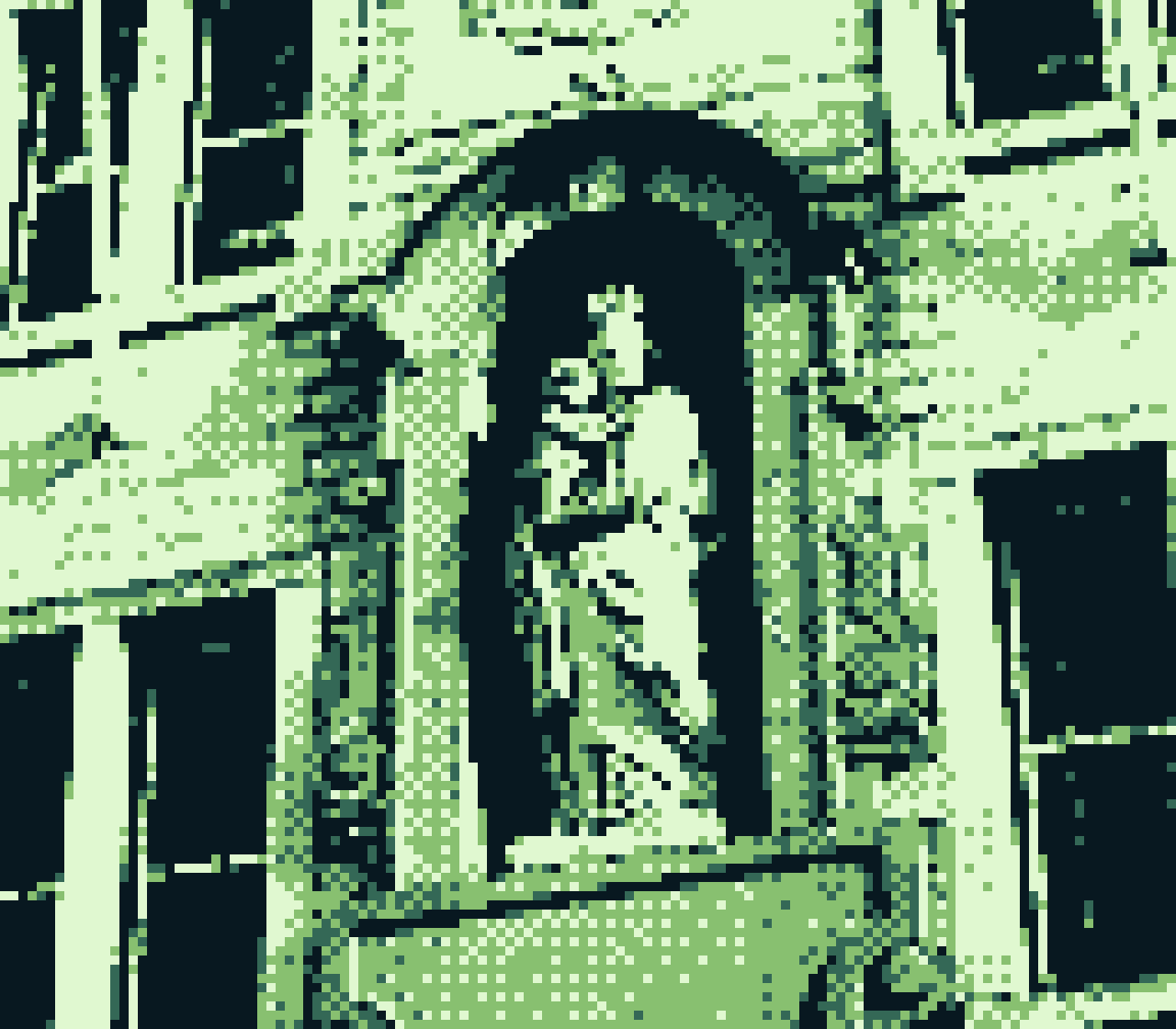 pixel photo of statue of saint Mary with child in a building facade