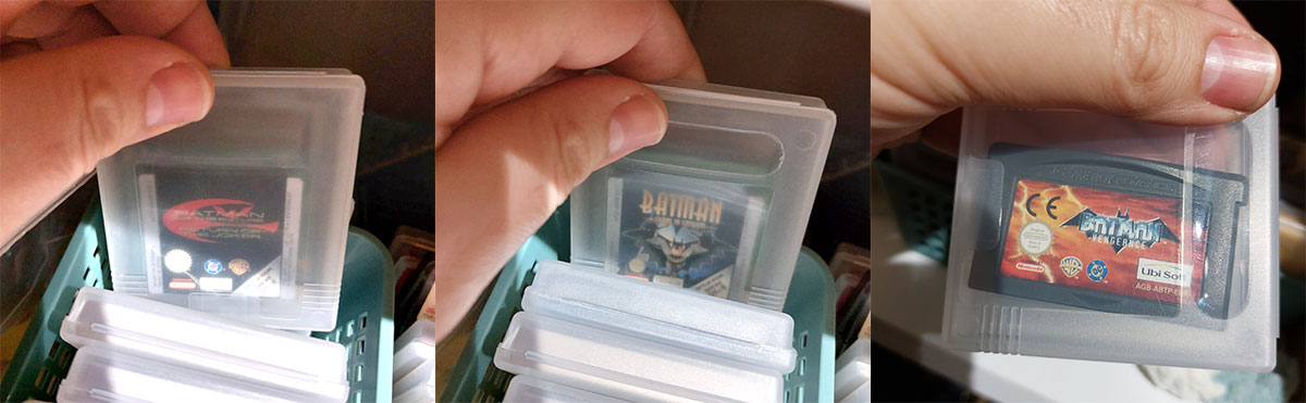 hand picking out and showing 3 game boy cartridges for 3 different Batman games